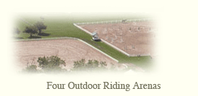 four outdoor riding arenas